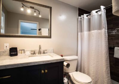 bathroom in Room 204 at Beachfront Inn