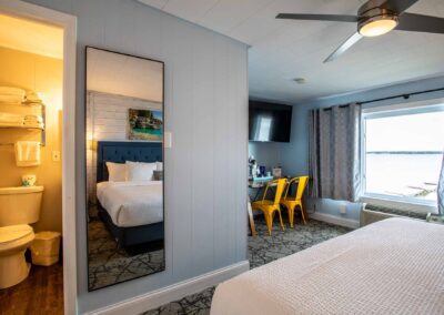 A view of the bathroom showing the large picture window in Room 112