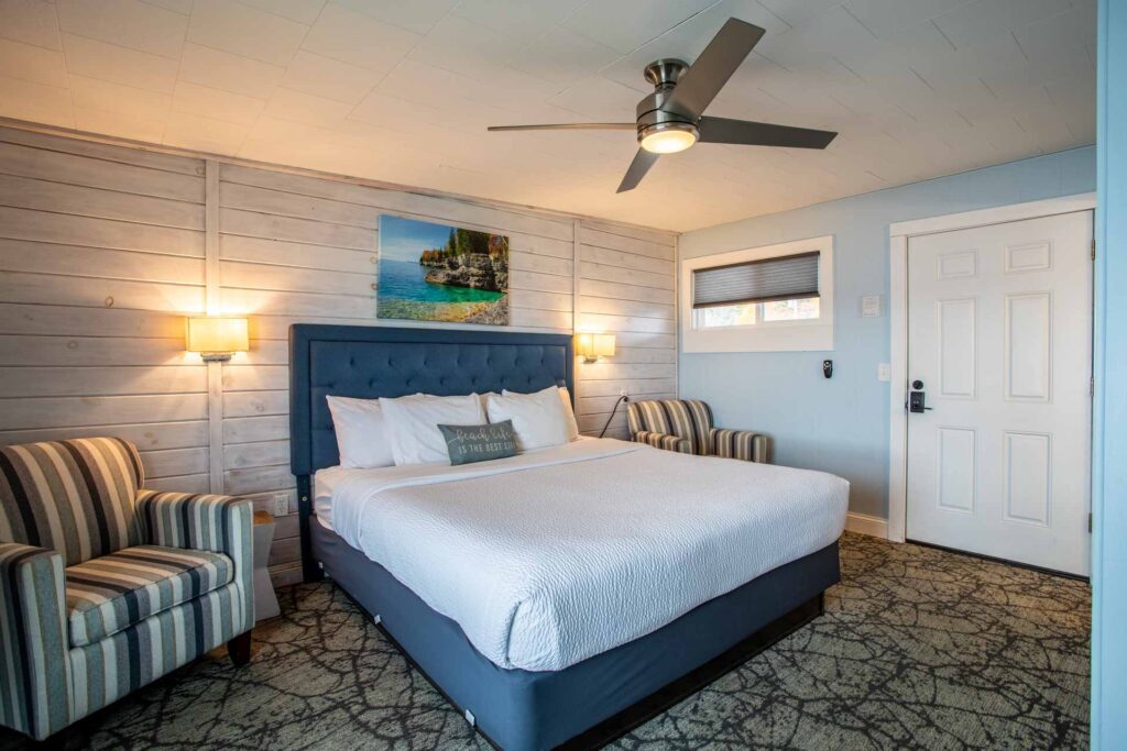 A view of the queen bed in room 203